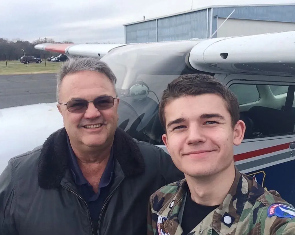 Gheorghe Ciobanu with his Civil Air Patrol mentor beside a Cessna