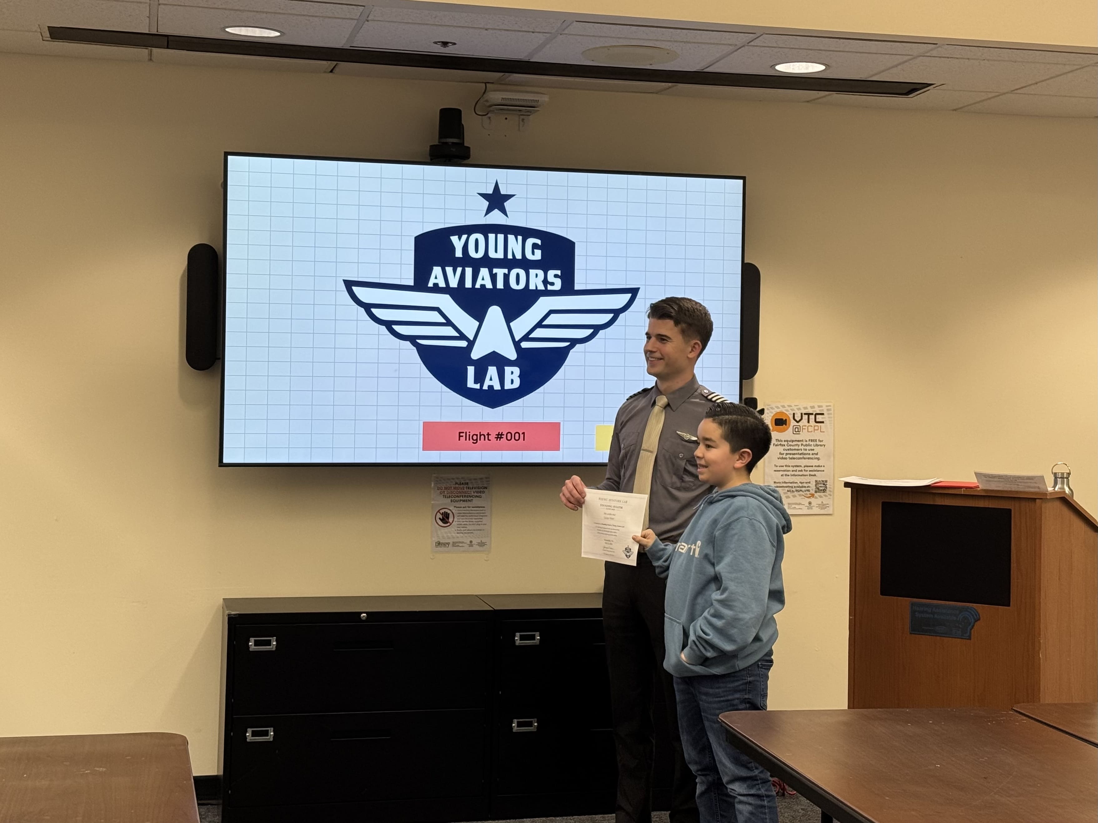 Children performing an aviation activity