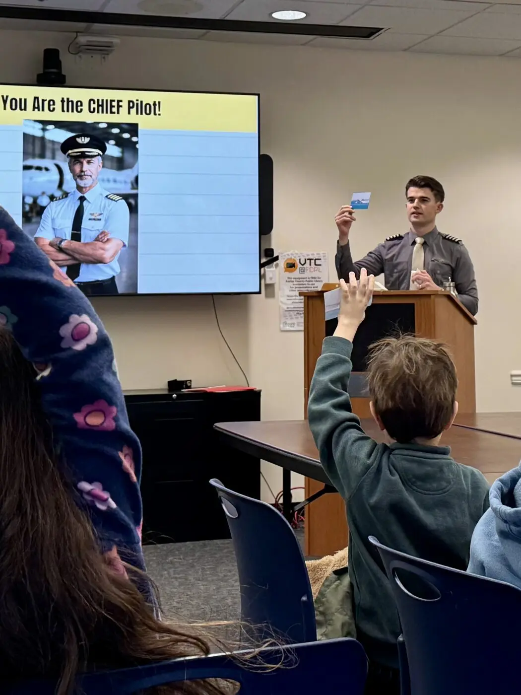 Captain Gheorghe Ciobanu leading a Young Aviators Lab session